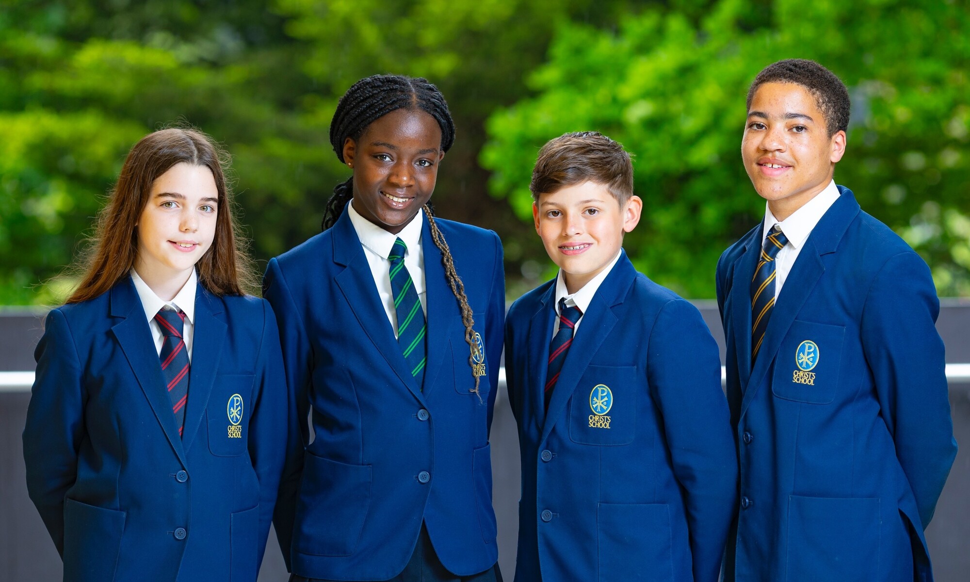 Christ's School Students Lined up for a group photo wearing their beautiful Uniform