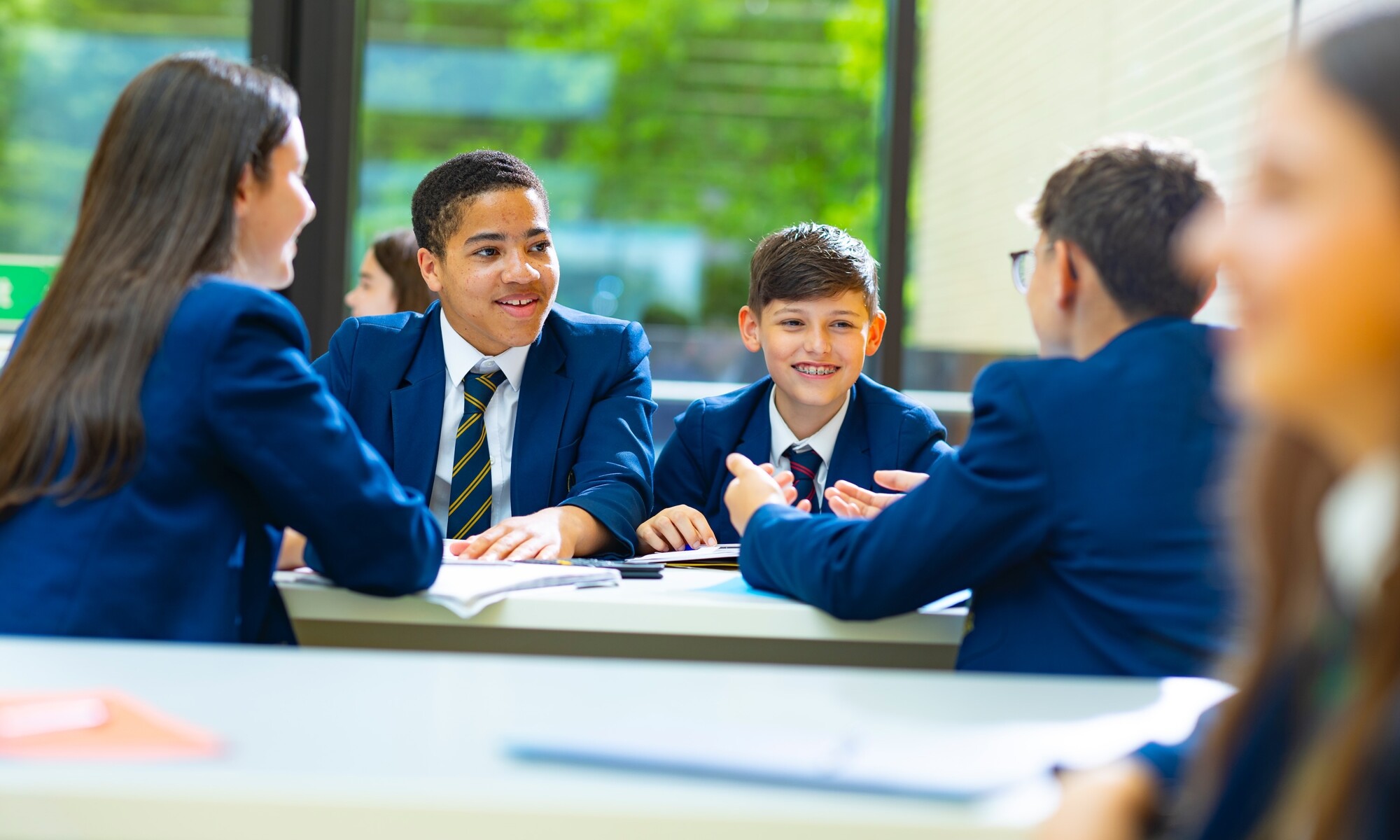 Christ's School Students Talking Together in Class