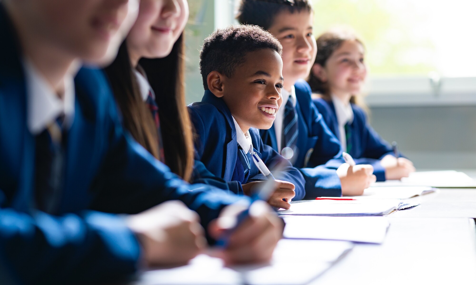 Christ's School Student Listening in Class